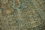 Distressed vintage Malayer rug texture with Herati motif in dusty teal and pale coffee brown tones.