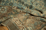 Distressed Malayer rug pile with even wear, faint foundation, ocean green blue, and beige.