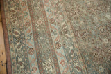 Distressed pile of a vintage Bibikabad carpet showing subtle blush, silver tones, and Herati motif.