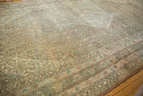 Detail of distressed Bibikabad carpet, showcasing time-softened Herati motif in beige, sand, and blush.