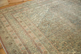 Distressed vintage Bibikabad carpet, dusty blush border with muted Herati field.