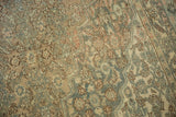 Even wear and muted Herati motifs on the distressed vintage Bibikabad pile.