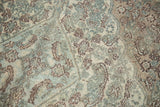 Distressed texture and faded Herati motif on this vintage Bibikabad carpet.