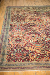 Antique Kerman rug, sprawling floral palmettes in cochineal red, powder blue, ivory, detailed border.