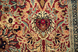Antique Kerman: cochineal red, ivory, powder blue floral palmettes with navy border.