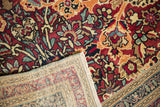 Hand-knotted reverse of antique Kerman carpet, showcasing fine weave and rich floral palmette pile.