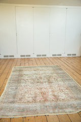 Distressed Isfahan rug corner, tree of life and deer, pale yellow silk, blush tones.