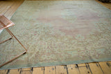Vintage Distressed Kerman carpet corner, Rococo floral motifs, dusty rose, and seafoam border.