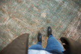 Vintage distressed Tabriz carpet's intricate floral vinery in faint powder blue and raspberry.