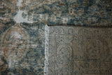 Distressed vintage Lilihan rug pile, exposed foundation, hand-knotted back, and ivory fringe.