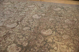 Detailed texture of a vintage Malayer carpet showing mostly even wear to the knot heads.