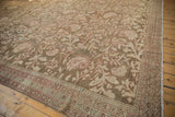Angled corner view of a vintage Malayer rug, showing its low-pile texture and intricate boteh pattern.