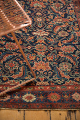 Dense Herati motif on antique Kurdish Bijar rug, with even pile wear and vivid colors.
