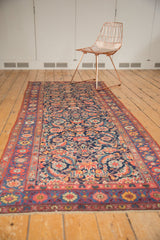 Antique Kurdish Bijar runner, intricate Herati field, madder red and navy borders, ivory fringe.