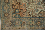 Antique Distressed Farahan Sarouk corner, dramatic floral spandrel in dusty teal and apricot.