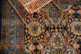 Vintage Bibikabad carpet's sky blue border with quatrefoil and splayed floral motifs.