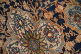 Splayed floral cross-sections and vine motifs in navy, ivory, and madder red.