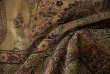 Textured antique Kermanshah carpet pile with beige, raspberry red, and navy patterns.