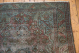 Distressed overdye Malayer rug texture with soft red, blue hues and foundation wear.