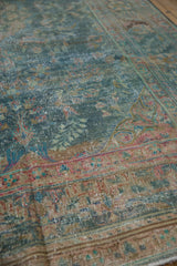 Distressed pile texture of vintage Malayer rug, with faded denim blue and red.