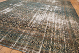 Distressed vintage Bibikabad carpet with exposed foundation, Herati motifs, ocean blue and sand tones.