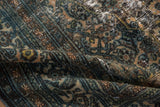 Distressed vintage Bibikabad carpet pile, revealing allover Herati motif with worn ocean blue and sand tones.