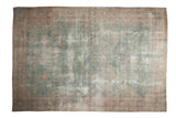 Vintage Persian Yazd carpet with faded powder blue and cochineal floral design. Low pile wear reveals foundation, 9x13.