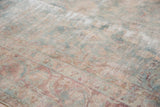 Vintage Yazd carpet's allover faded floral design, powder blue and cochineal, with mostly even wear.