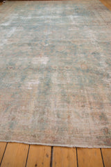 Vintage Fragment Yazd Carpet bottom edge, showing delicate fringe, mostly even wear, and faded pale tones.