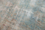 Vintage Yazd carpet detail with mostly even wear, faded powder blue, cochineal floral motifs.