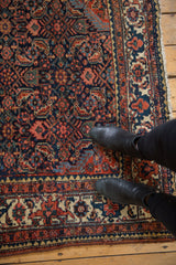 Hand-knotted Persian Vintage Tajabad rug with navy, red Herati motif and pomegranate border.