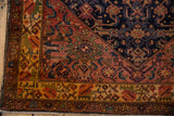 Corner detail of vintage Malayer rug, large floral border and Herati motif field.