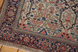 Antique Farahan Sarouk rug edge: navy border, madder red motifs, ivory field with samovar turtle design.