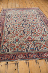 Madder root red, navy Farahan Sarouk rug with allover samovar turtle motif and even wear.