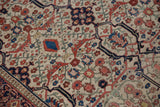 Antique Farahan Sarouk rug detail with samovar turtle motif, diverse floral designs, and even wear.