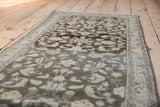 Faded charcoal and oxidized silver vinery motif on distressed vintage Hamadan runner.