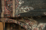 Distressed vintage Malayer rug showcasing short pile and muted curvilinear border motifs.