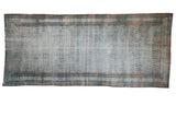Distressed Persian Malayer carpet with a faded boteh design in dusty teal and pale raspberry terracotta.