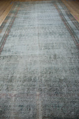 Textural wear and exposed knot heads on a vintage Persian Malayer carpet.