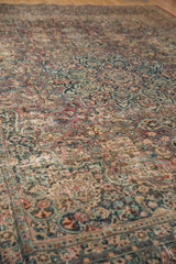 Vintage Distressed Meshed carpet, scrolling floral patterns, mostly even wear, wine red, navy, sand.