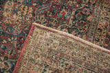 Vintage Distressed Meshed carpet corner, worn pile showing foundation, with fringe details.