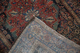 Antique Farahan Sarouk rug showing hand-knotted foundation, worn Herati motif pile, and original selvage.