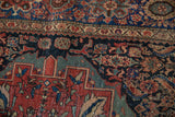 Antique Farahan Sarouk rug's navy, madder red, mallard green Herati motif, mostly even wear.