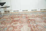 Decorative, faded pattern of a vintage Persian Tabriz rug with a soft, low pile.
