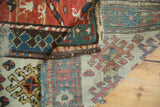 Polychromatic side selvage and distressed hand-knotted foundation of an antique Kazak rug.