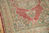 Worn pile and exposed foundation of antique Silk Kaisary rug with Oushak-style motifs.