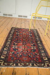 Hand knotted Lilihan runner corner: wine red field, teal lotus flowers, ivory fringe.