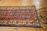Vintage Persian Malayer rug with navy Herati field and colorful ivory border.