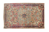 Vintage Kerman rug, roundel medallion, mil fleur, ivory, red, blue.