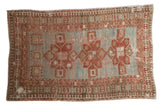Distressed antique Caucasian rug, triple rectilinear medallion, powder blue field, and terra cotta borders, 4' x 6'3